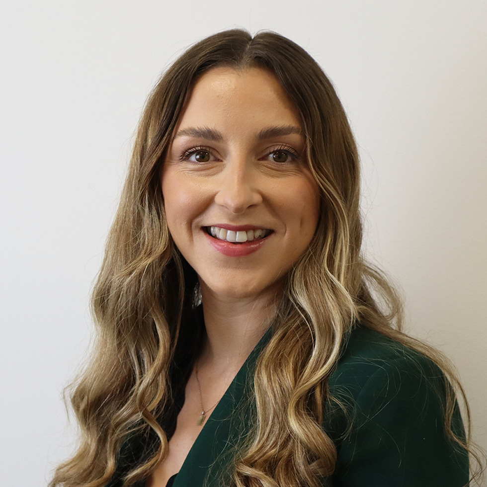 Laura Demirkazik smiling at the camera