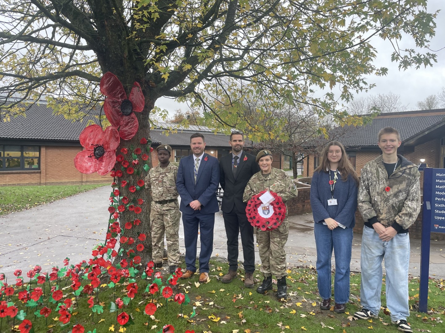 Left to right: Goodness, Mr Cronin (Headteacher), Mr D Stead (Deputy Headteacher); Phoebe (Head Girl) and Harrison (Head Boy).